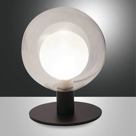 Elegante Teramo Tischbeleuchtung Ø 12cm mit klarer Glaskugel und modernem Design auf schwarzem Sockel.