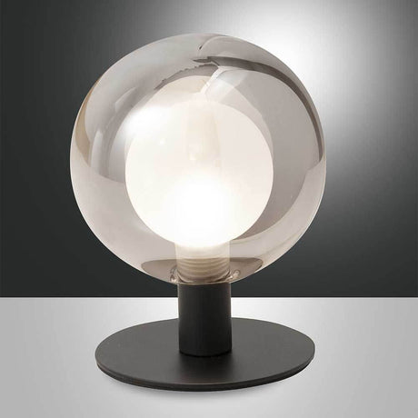 Teramo Tischbeleuchtung Ø 12cm in runder Form mit eleganter Glaskugel und schwarzem Sockel.