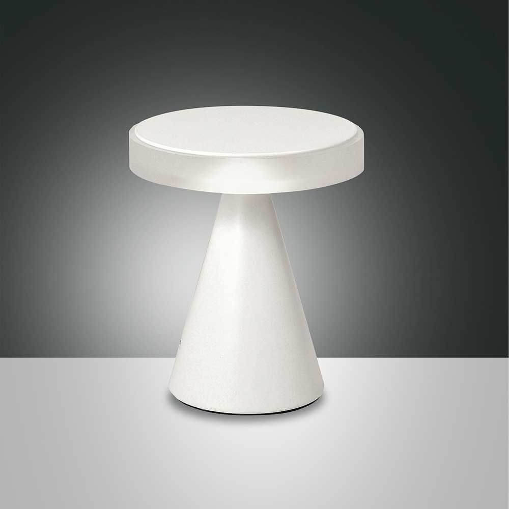 moderne LED Tischleuchte Neutra auf einem modernen Tisch mit minimalistischem Design.