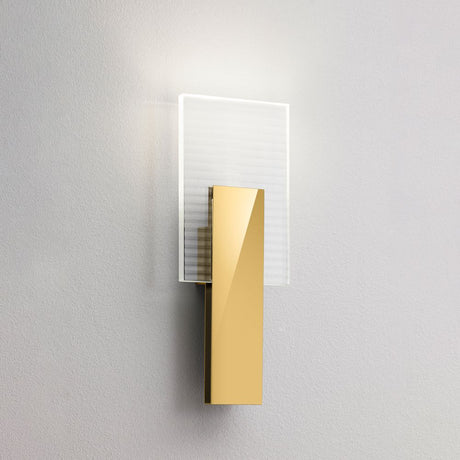 Fabbian Amulette LED wall light with ribbed glass and a glossy gold frame