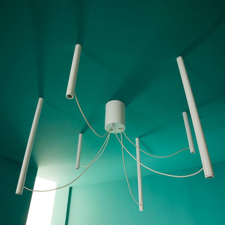 Fabbian Ari LED pendant light, 6-light, in white with black PVC cables and elegant ceiling mount.