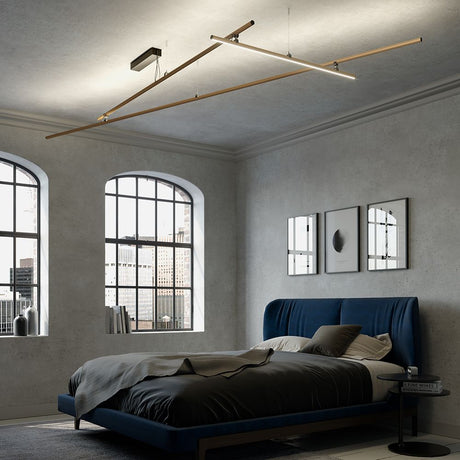 Fabbian Freeline LED-adjustable ceiling light in a modern bedroom with blue bedding.