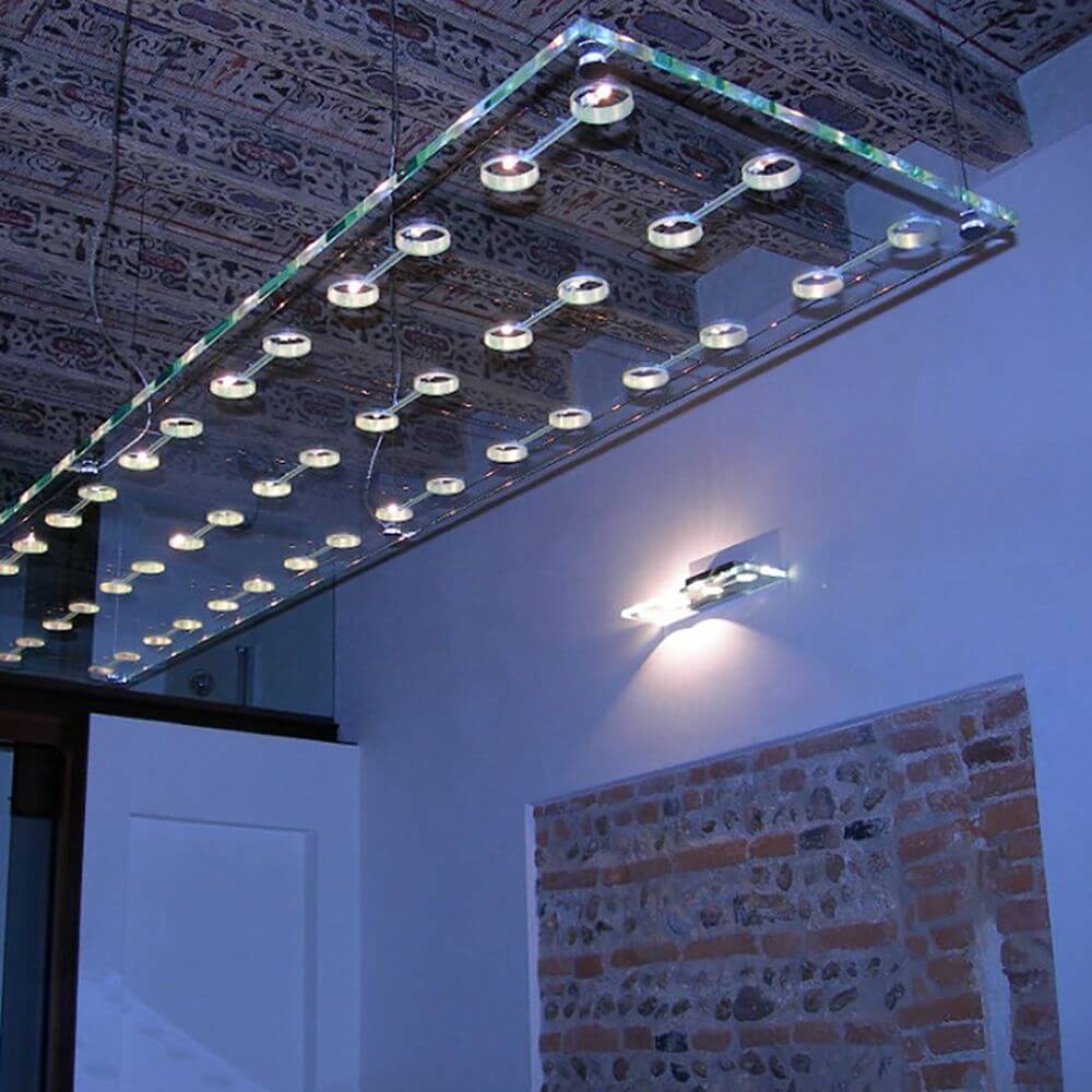 Fabbian Sospesa Hängeleuchte 48-flammig in modernem Design mit Halogenlampen und LED-Beleuchtung.
