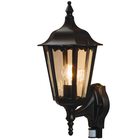 Applique da esterno Firenze Sensor nera con design elegante e funzione sensore integrata per l’illuminazione esterna.
