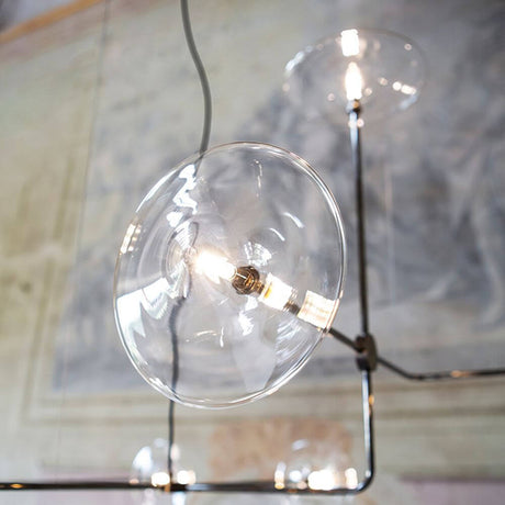 Essenza Hängelampe Brosilikatglas Flach mit handgefertigtem gläsernen Design und charmantem Licht.