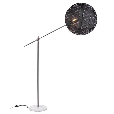 Detailed view of the Forestier floor lamp Chanpen Hexagonal with a geometric lampshade and marble base.