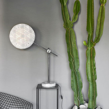 Forestier table lamp Chanpen with marble base next to a cactus in a modern living setting.