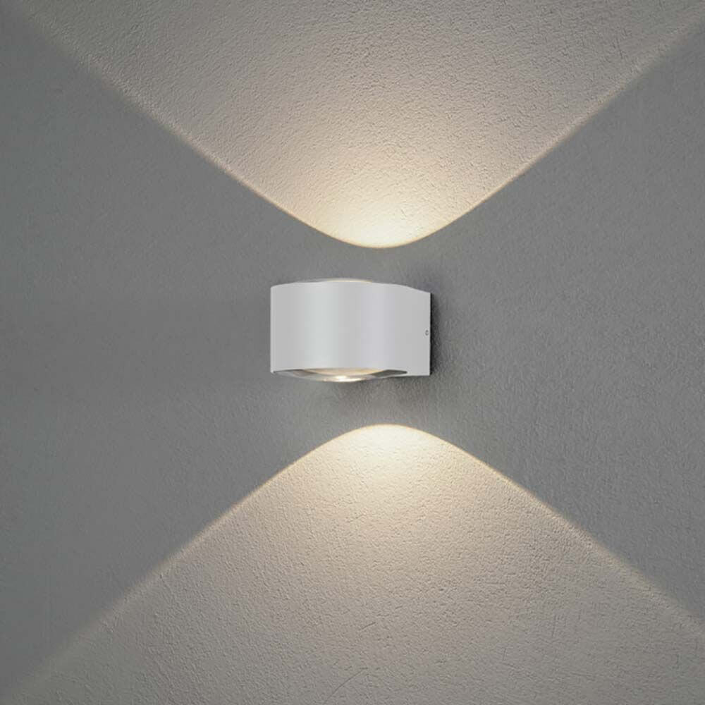 Gela LED Außenwandleuchte Up & Downlight in Weiß an einer Wand