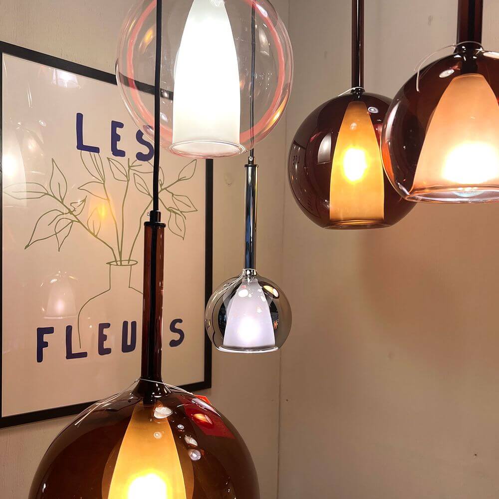 s.luce Belluna Glas-Pendelleuchte 150cm Textilkabel in eleganten Farben und Designs, ideal für Essbereiche.