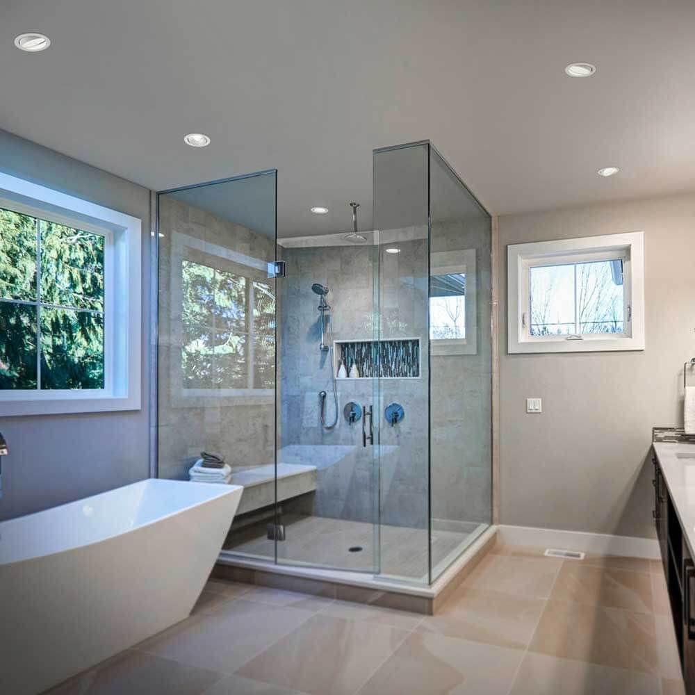 Moderne Dusche in stilvollem Badezimmer mit Einbauspot Sid IP65, ideal für Nassbereiche.