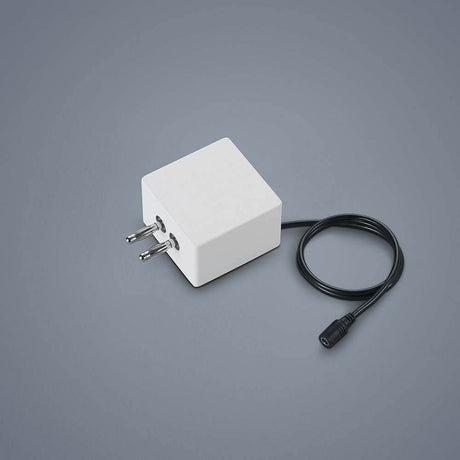 Embout avec alimentation par câble Vigo Blanc - bloc d’alimentation blanc avec raccordement par câble sur fond gris.