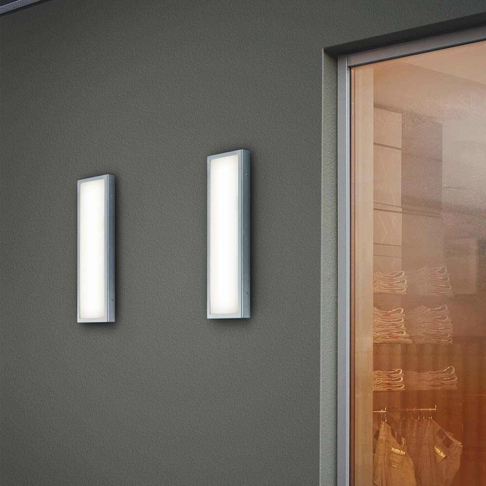 LED Wandaussenleuchte Scala IP44 Edelstahl an einer Wand, modernes Design, energiesparend und wetterfest.
