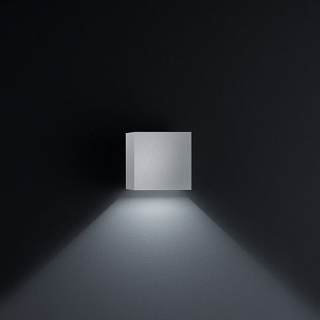 LED Outdoor wall light Siri 44 IP54 nickel matt on a wall, radiant light directed downward.