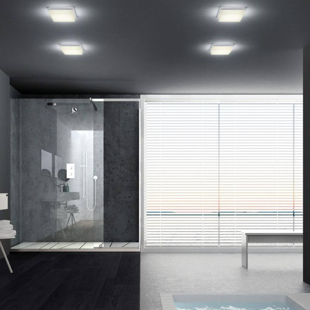 LED Decken-Badleuchte Cosi 610lm IP30 in modernem Badezimmer mit Dusche und großen Fenstern.