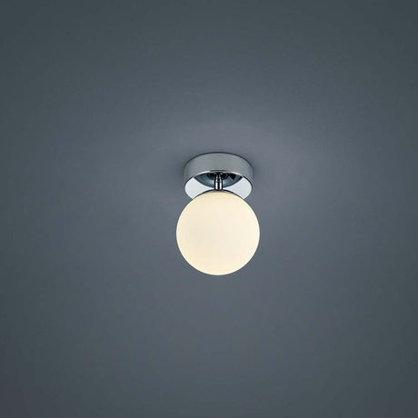LED Keto chrome ceiling light with a stylish, round design and a glossy chrome top.
