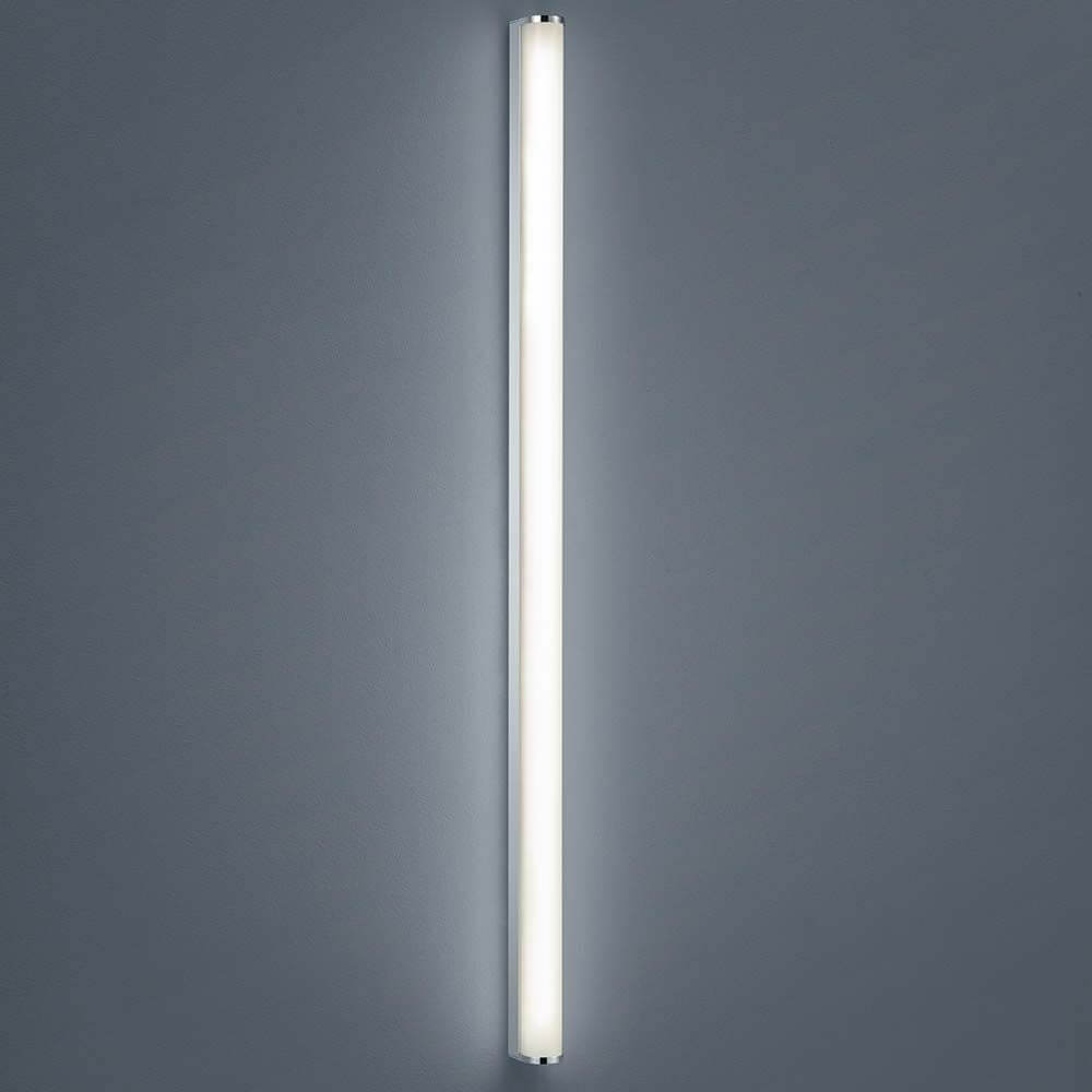 LED Wandleuchte Ponto Chrom an einer Wand, modernes und elegantes Design für Ihre Beleuchtung.