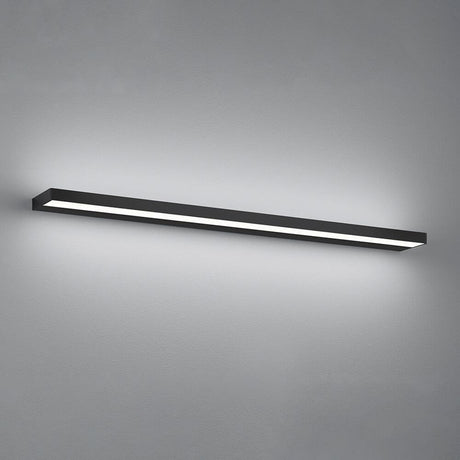 LED Skifer væglampe IP44 Sort monteret på en væg, tilbyder elegant uplight og downlight til ethvert rum.