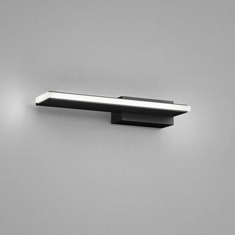 LED Wandleuchte Nex Schwarz an einer Wand, ideal für Flur und Büro.