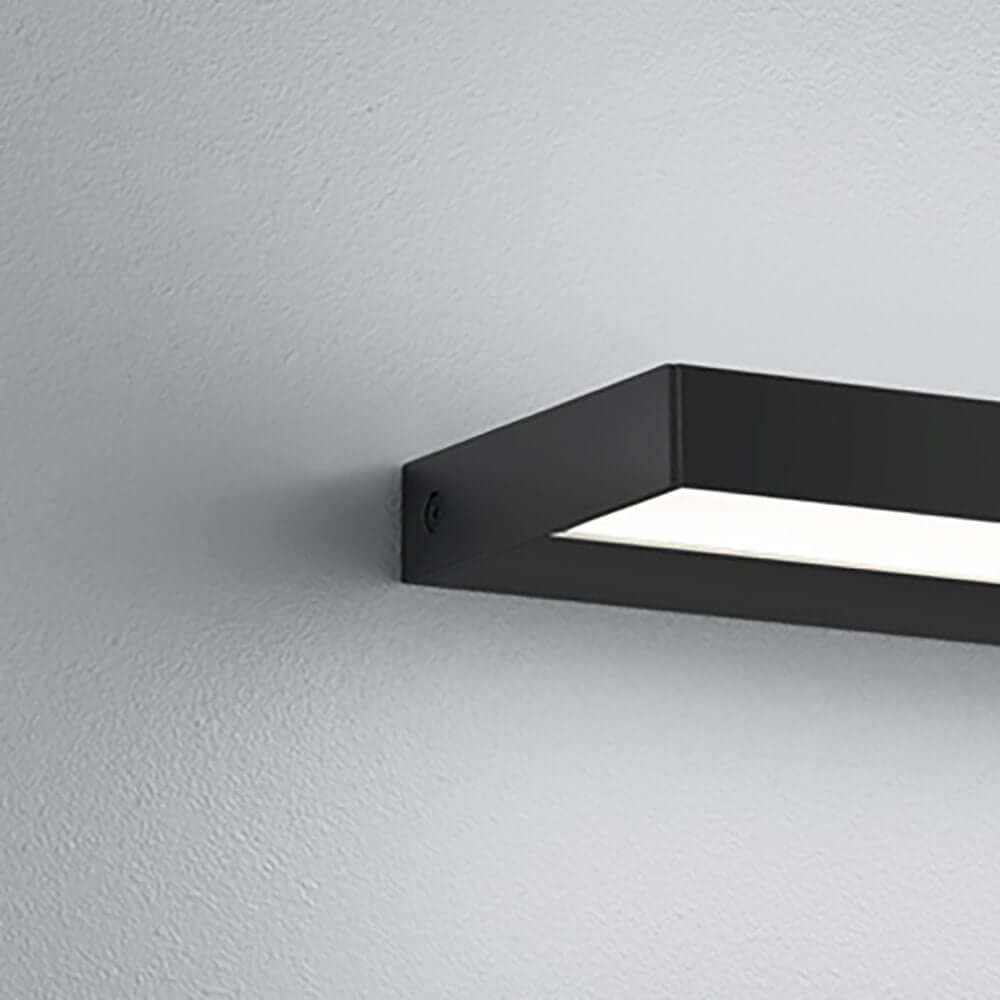 LED Wandleuchte Slate IP44 Schwarz an Wand montiert, stilvolles Up- und Downlight für Räume.