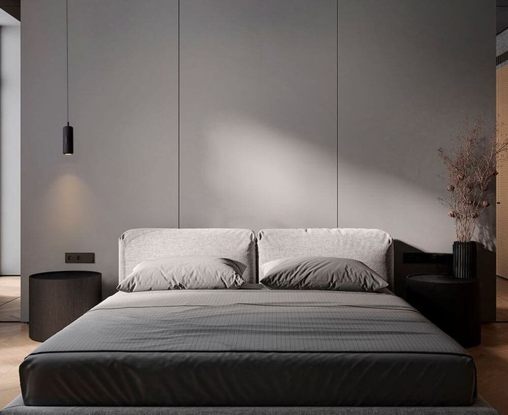 Holm LED Pendelleuchte Ø 13cm 3000K über modernem Schlafzimmer mit minimalistischer Einrichtung.