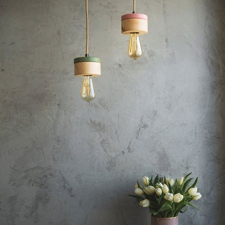 Suspension en bois Ø 11 cm en 3 essences de bois, suspension minimaliste dans de délicats tons pastel.