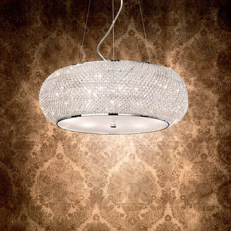 Pasha Sp10 krom hængelampe i elegant design med strålende krystaller på en klassisk baggrund.