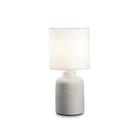 Kali table lamp with relief decoration, elegant table lamp with a modern design and stylish relief pattern.