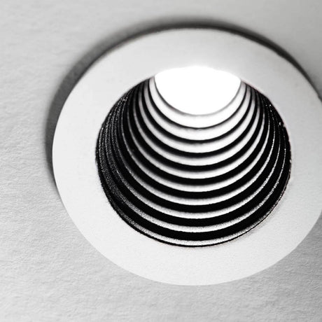 One LED Einbauspot - Nahaufnahme des Einbauleuchtens mit spiralförmigem Design.