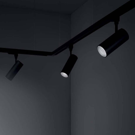 Smile track light 20W Cri80 20 3000K black mounted on a ceiling, designed in black.