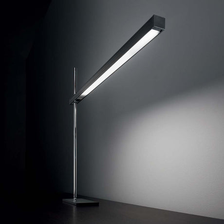 Tischleuchte Gru Tl105 Schwarz moderne und elegante Tischlampe mit LED-Licht auf einem Tisch platziert.