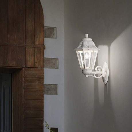 Wall light Anna Ap1 large white on a wall, elegant white lighting for indoor and outdoor use.