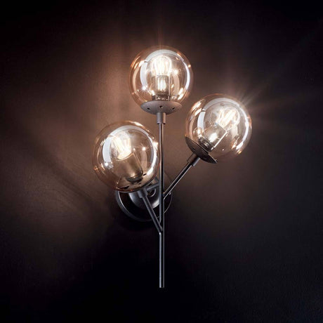 Kepler Ap3 wall light with three bulbs in a modern design mounted on a wall