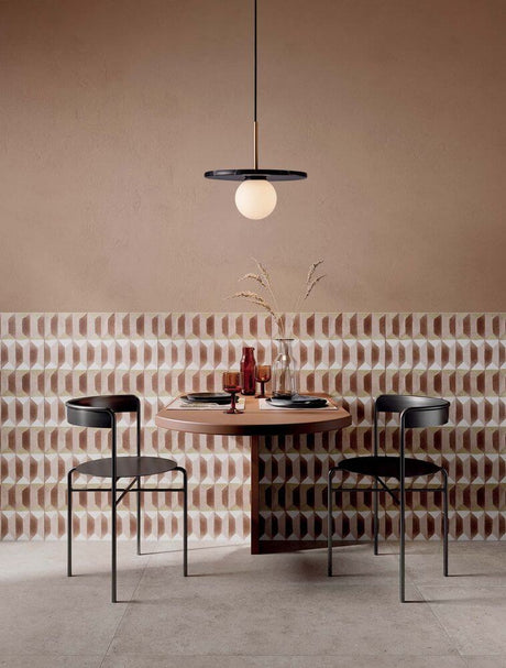 Idor pendant light Ø 30cm G9 marble above a modern table in a stylish dining room.