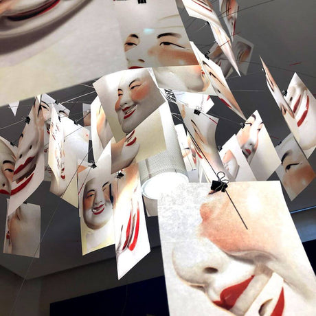 Ingo Maurer Pendant light Zettel'Z A5 Laughing Buddha Limited - details with porcelain masks and Japanese paper.