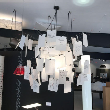 Ingo Maurer Zettel'Z 6 pendant lamp with special length, creative lighting installation with blank and printed notes.