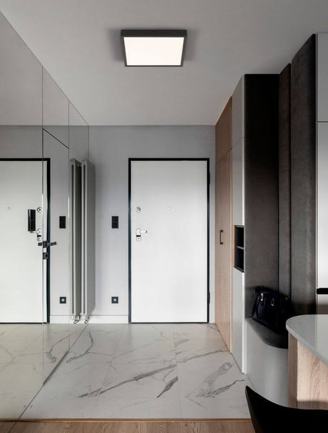 Plafonnier Itos LED 3000K dans un espace moderne avec un aménagement minimaliste et un éclairage élégant.