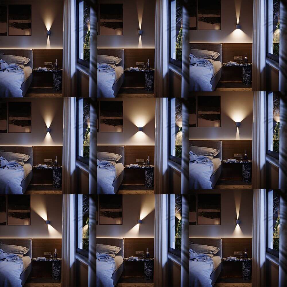 s.luce Ixa LED Wandlampe mit Bewegungsmelder in einem modernen Schlafzimmer