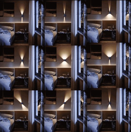 Gemütliches Schlafzimmer mit sanfter Beleuchtung, Bett und Nachttisch, ideal für entspannende Nächte.