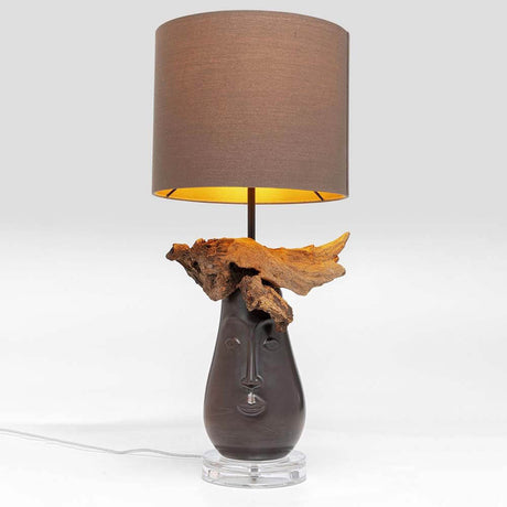 Tischleuchte Nature Face mit einem einzigartigen Design aus Holz und einem stylischen Lampenschirm.