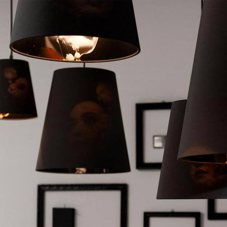 Karman Cupido textile pendant light with decorative shades in a modern living environment.