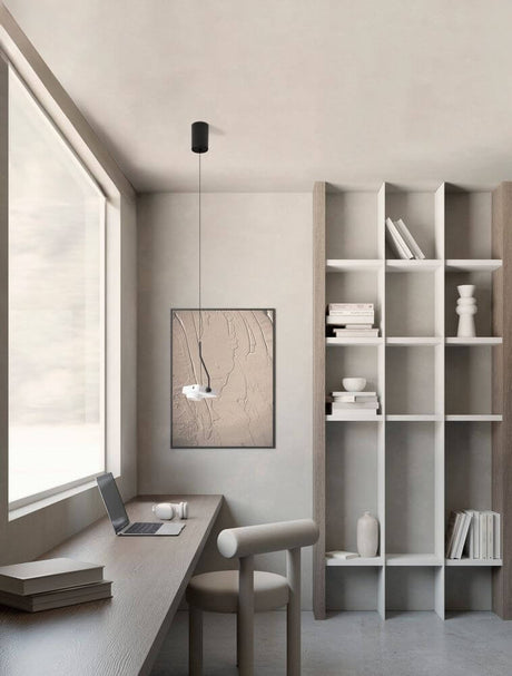 Modern Kedros LED pendant light 3000K in a stylish workspace with desk and shelf.