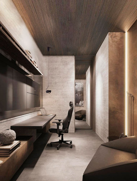 Modern office interior with desk and ergonomic chair in a stylish room.