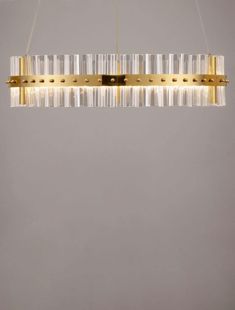 Kezo LED Pendelleuchte Ø 60cm 3000K Gold in minimalistischem Design mit goldfarbenem Edelstahl und klarem Glas.