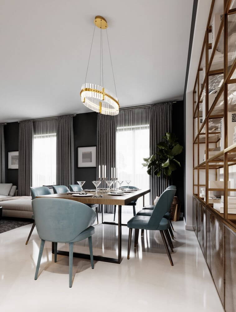 Kezo LED Pendelleuchte Oval Ø 90cm 3000K Gold im eleganten Esszimmer mit blauen Stühlen und stilvollem Tisch.