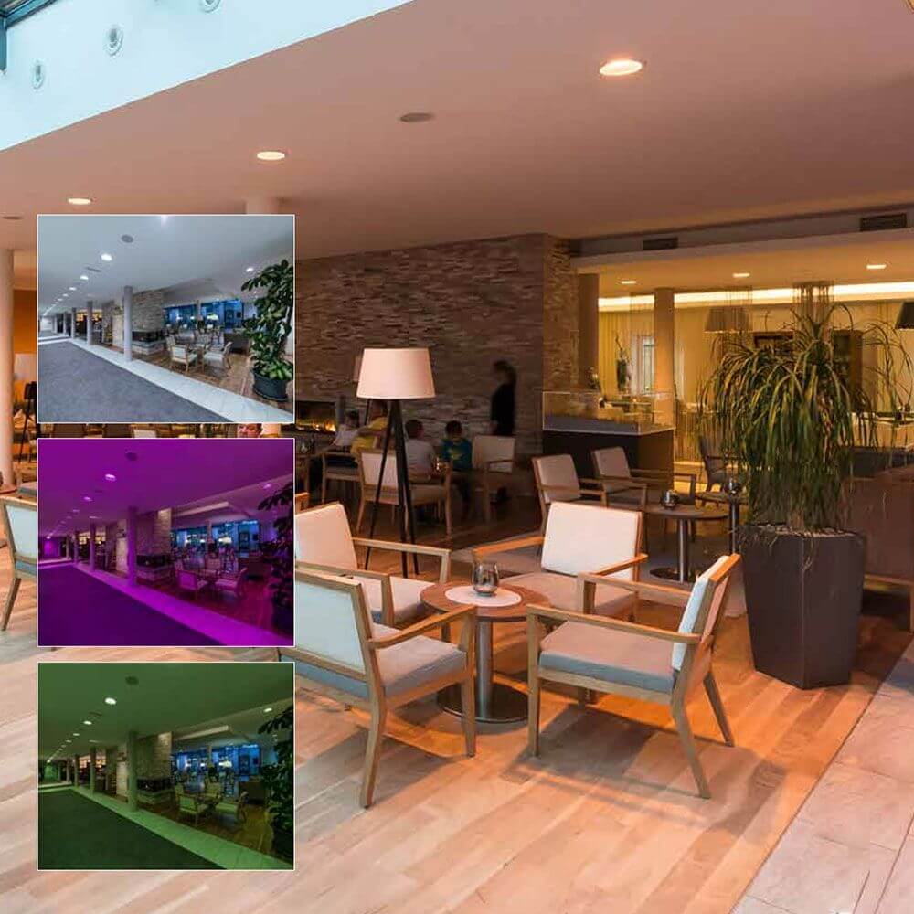 Atrium Ronq Einbaupanel LED RGB CCT HCL Panel in modernem Innenraum mit verschiedenen Beleuchtungsfarben.