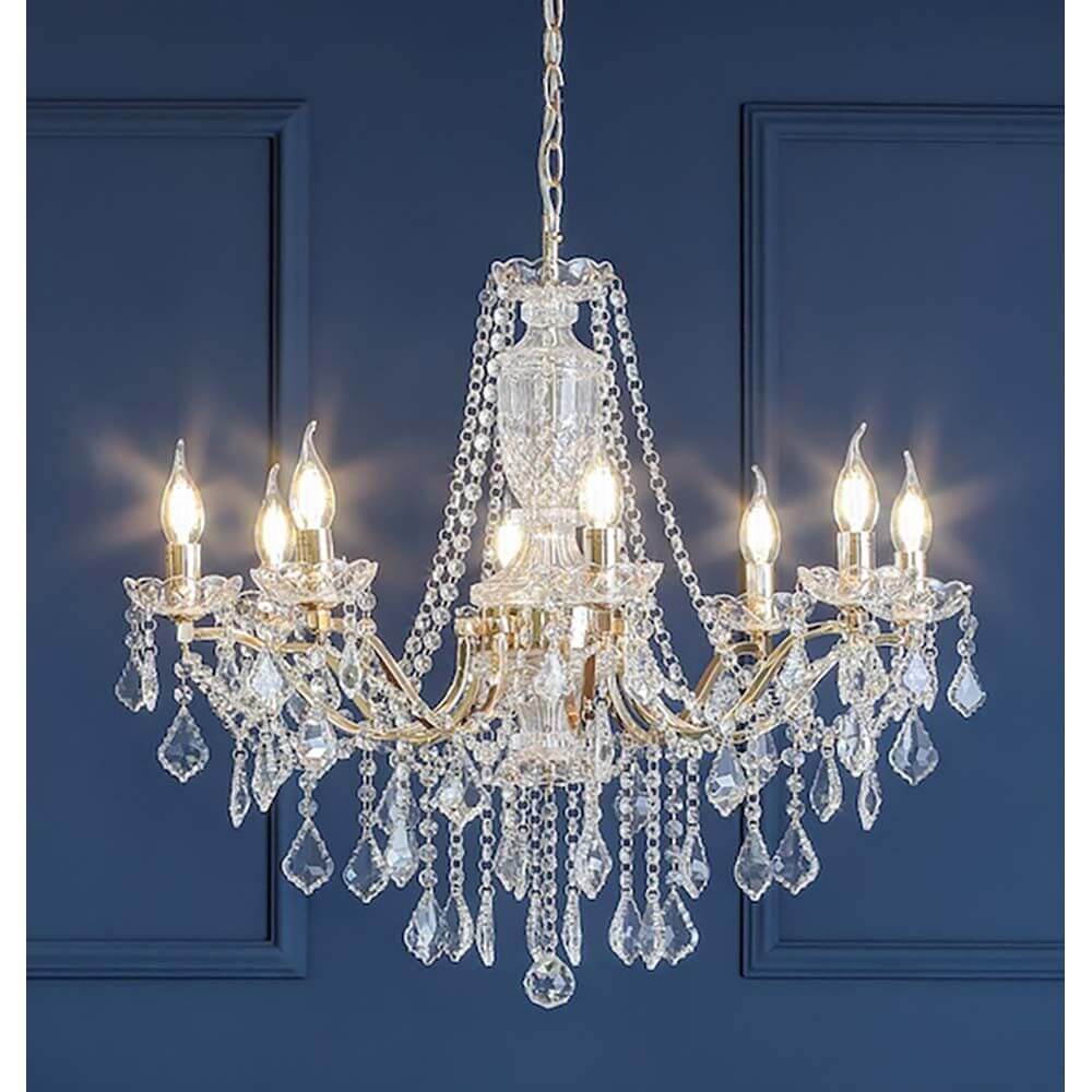Kronleuchter Odessa 8-flg. Goldfarben, Transparent mit elegantem Design und funkelnden Kristallen.
