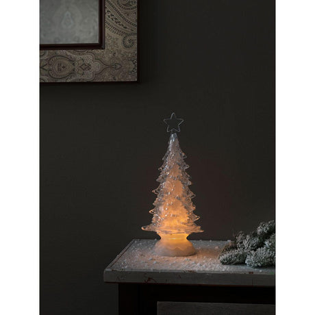 LED Acryl Weihnachtsbaum rotierend 3 Warmweiße Diode batteriebetrieben auf einem Tisch mit sanftem Leuchten.