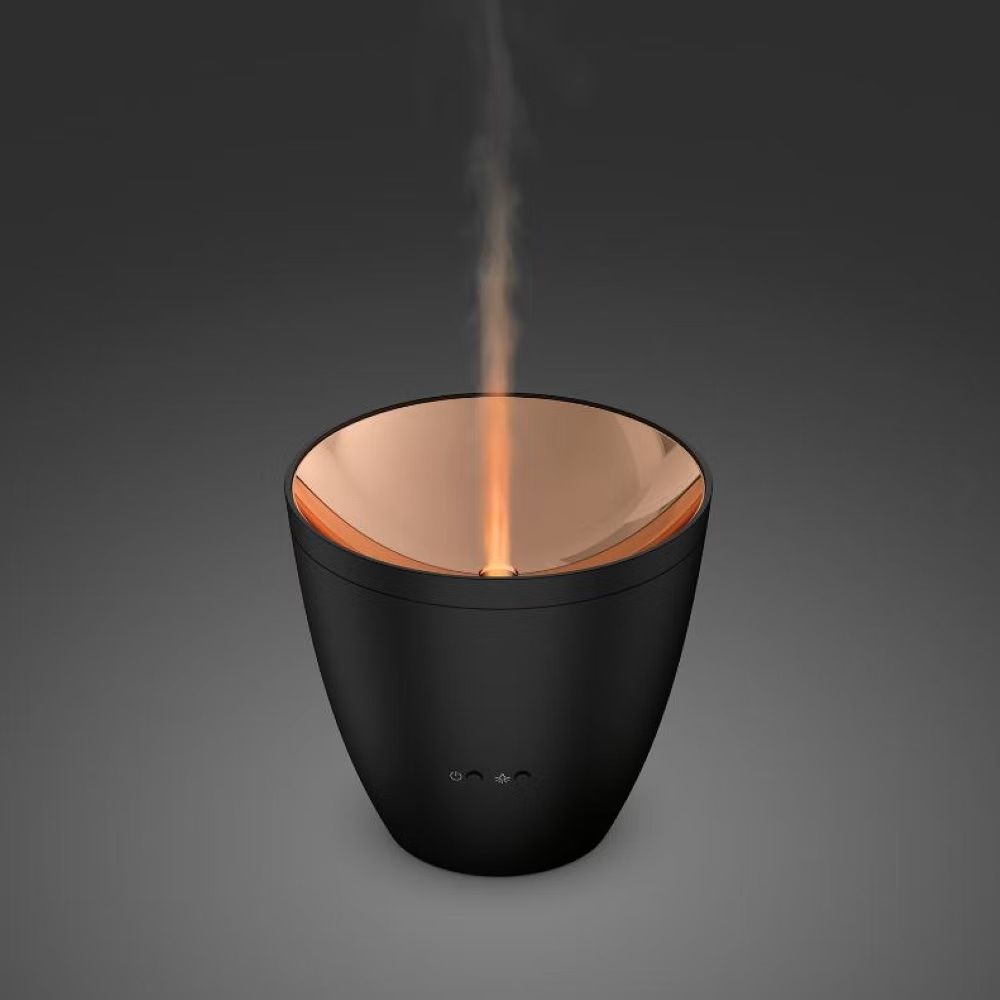 LED Aroma Diffuser Zoe mit bernsteinfarbenem Licht und kühlendem Nebel für aromatische Entspannung.