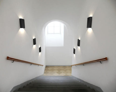 LED Fold 15 IP54 outdoor wall light installed on a staircase, wall lights provide stylish illumination.