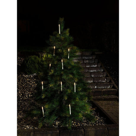 5 LED candle add-on set for 1930-100 5 warm white IP44 on a decorated Christmas tree at night.